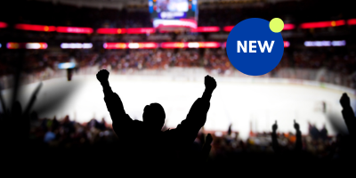 Fan cheering at sporting event