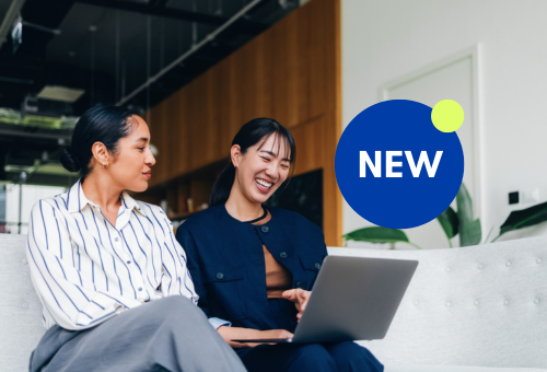 Woman smiling looking at her laptop
