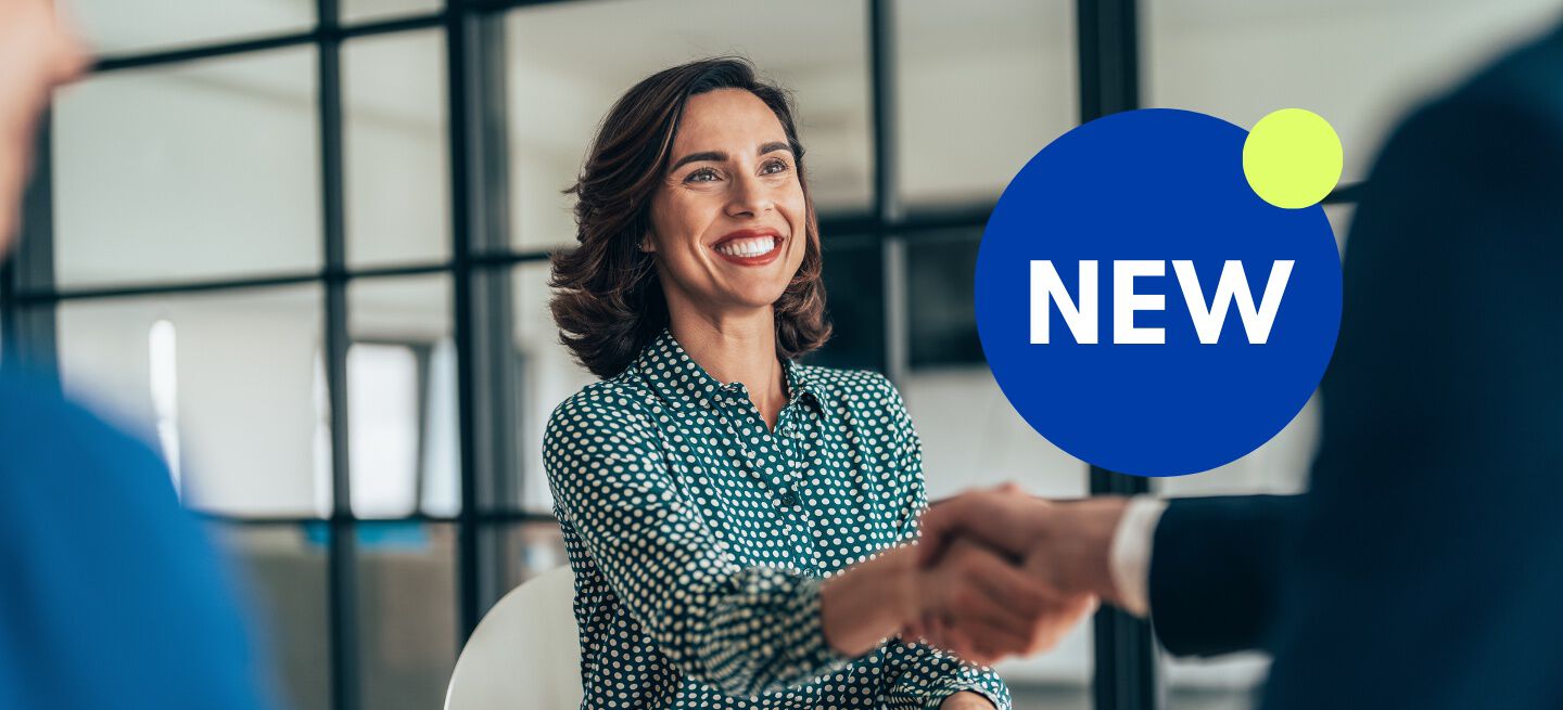 Woman smiling and shaking hand