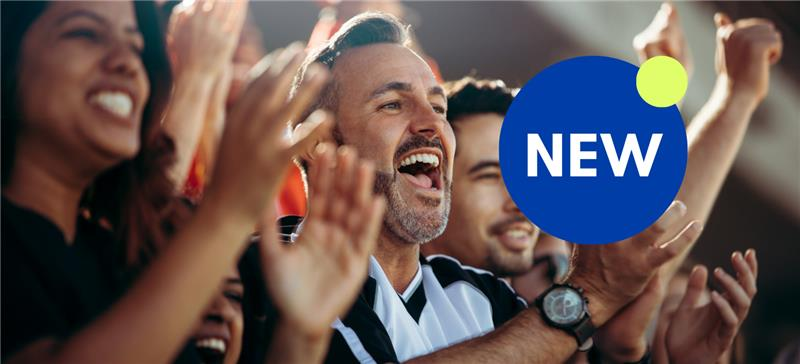 Crowd of people cheering.